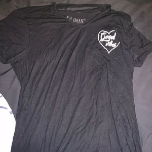 Black shirt “good vibes”